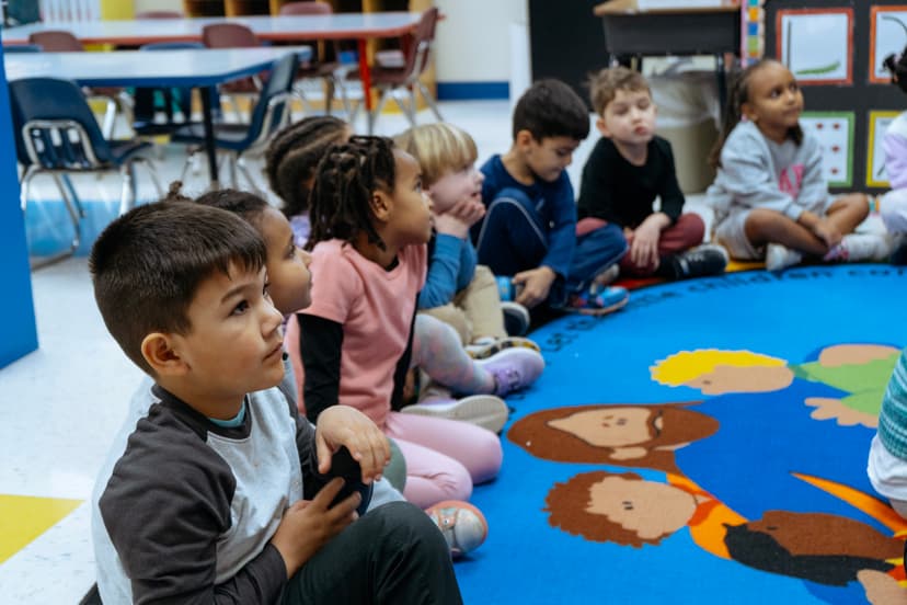 Child thoughtfully looking up, representing individual growth
